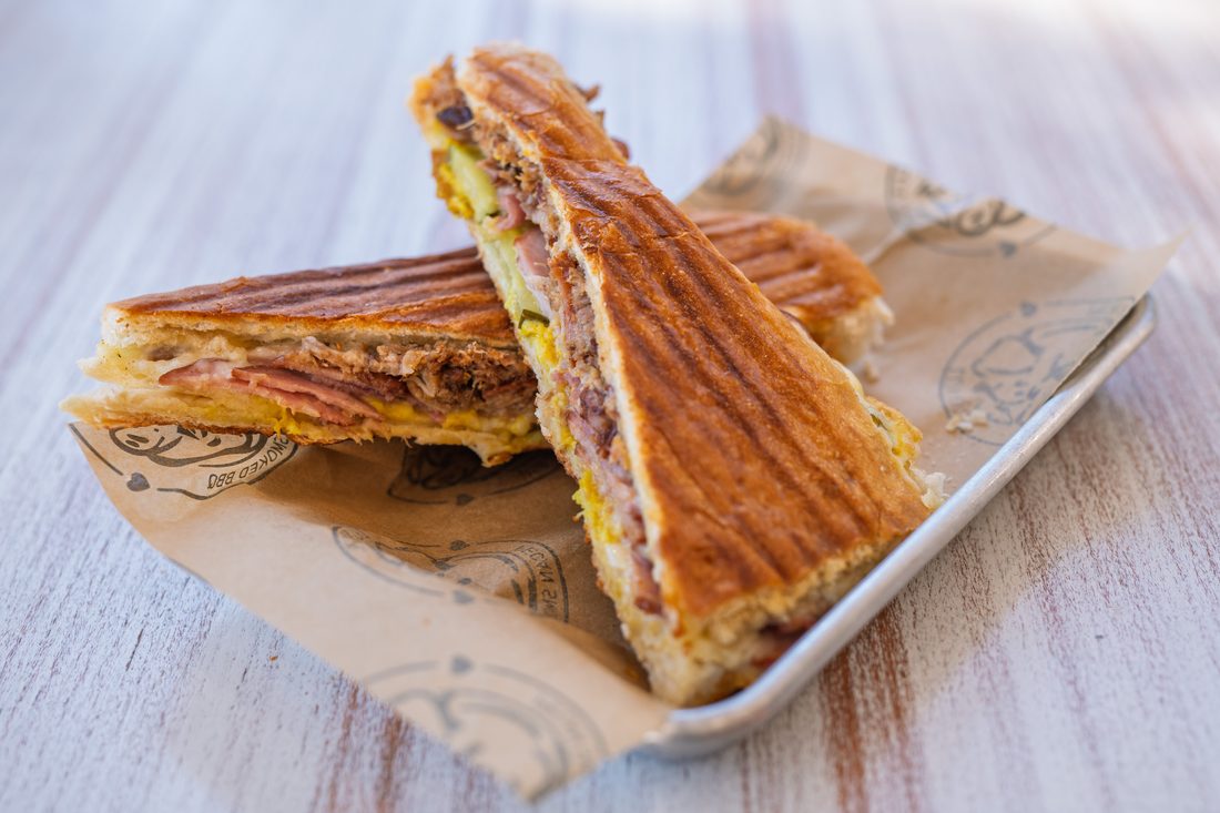 Award Winning Cuban — Smoked pork, ham, swiss, pickles, mustard. Pressed Cuban bread.